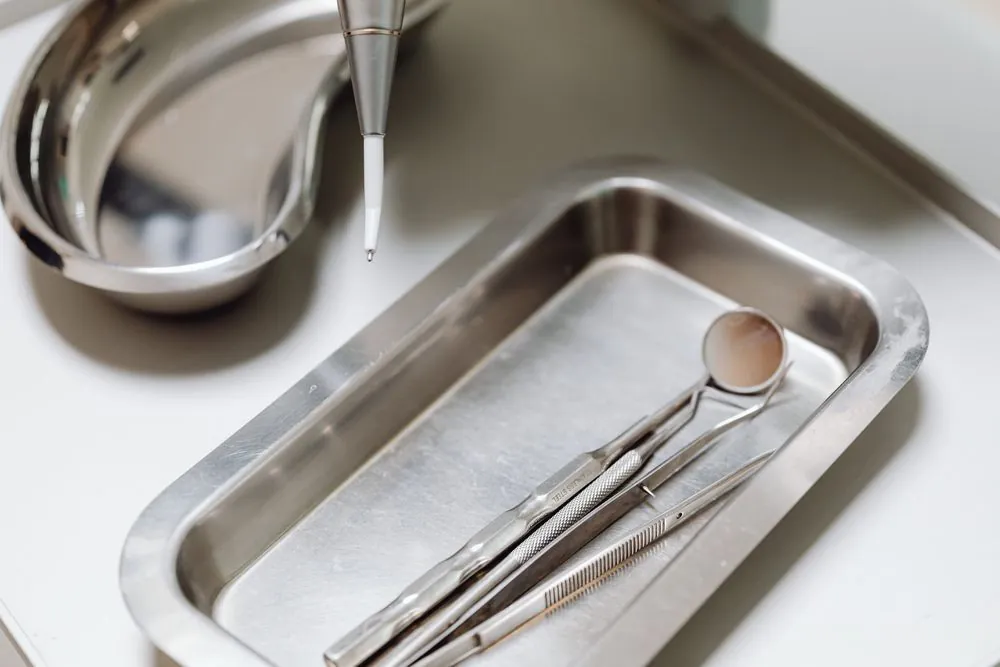 A tray of dental instruments seen close up